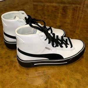 Brand new Puma platform high top sneakers
